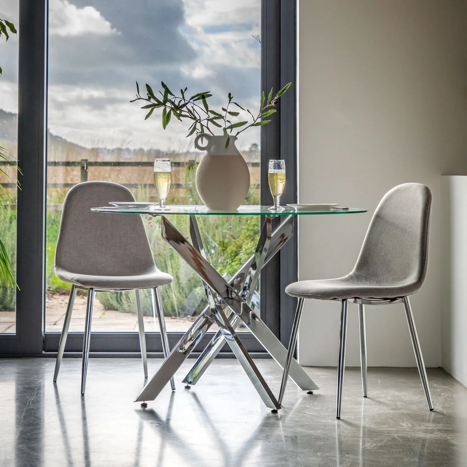 110cm Round Glass Dining Table with Chrome Legs